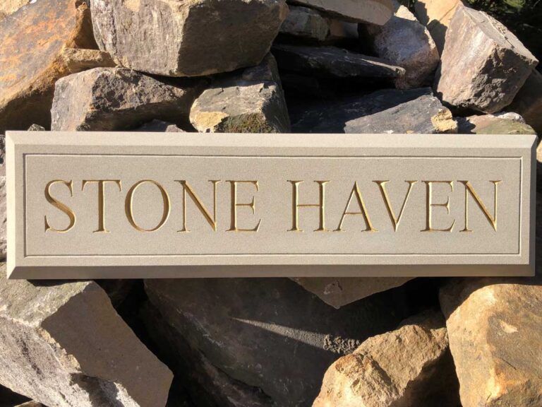 Stone house name and number plaques and hand carved sandstone signs