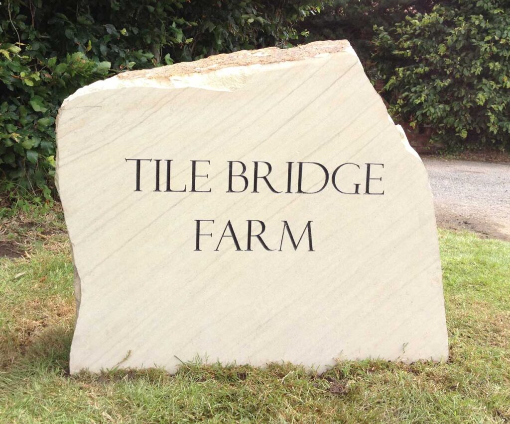 Large freestanding hand carved stone signs, boulders and waymarkers